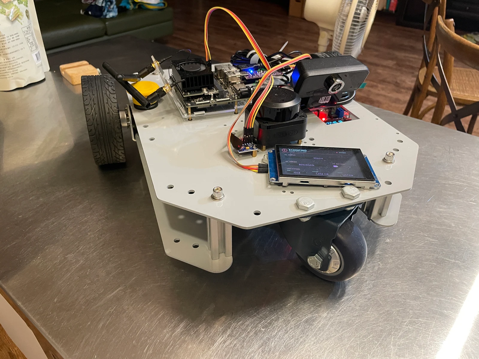 Front three-quarter view of Benjamin’s assembled robot, showing wheels, electronics and base