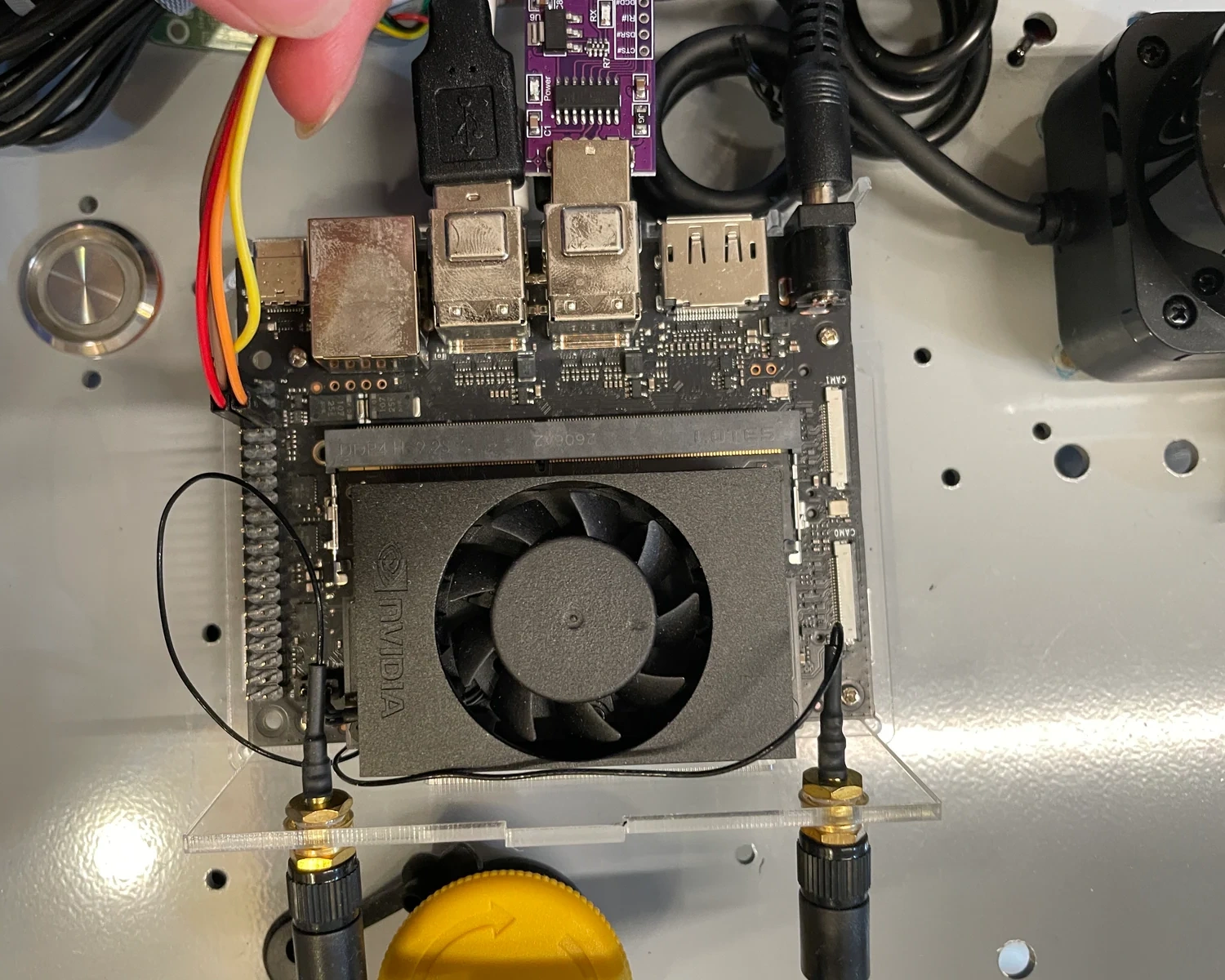 Close view of the mounted Jetson board, fan and connectors