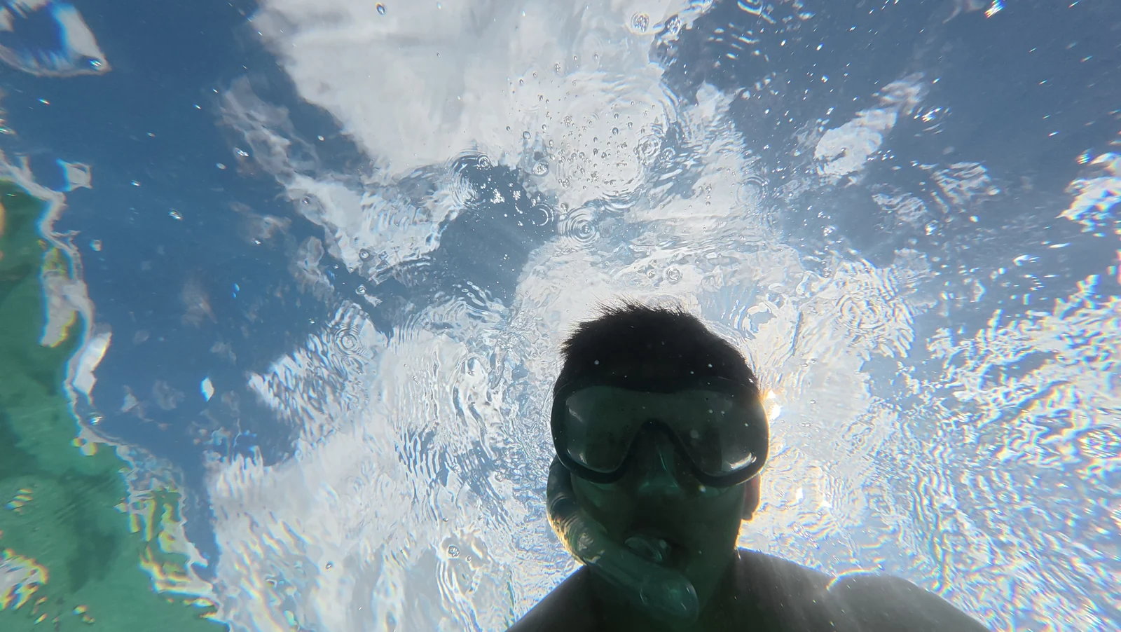 Benjamin wearing a mask underwater