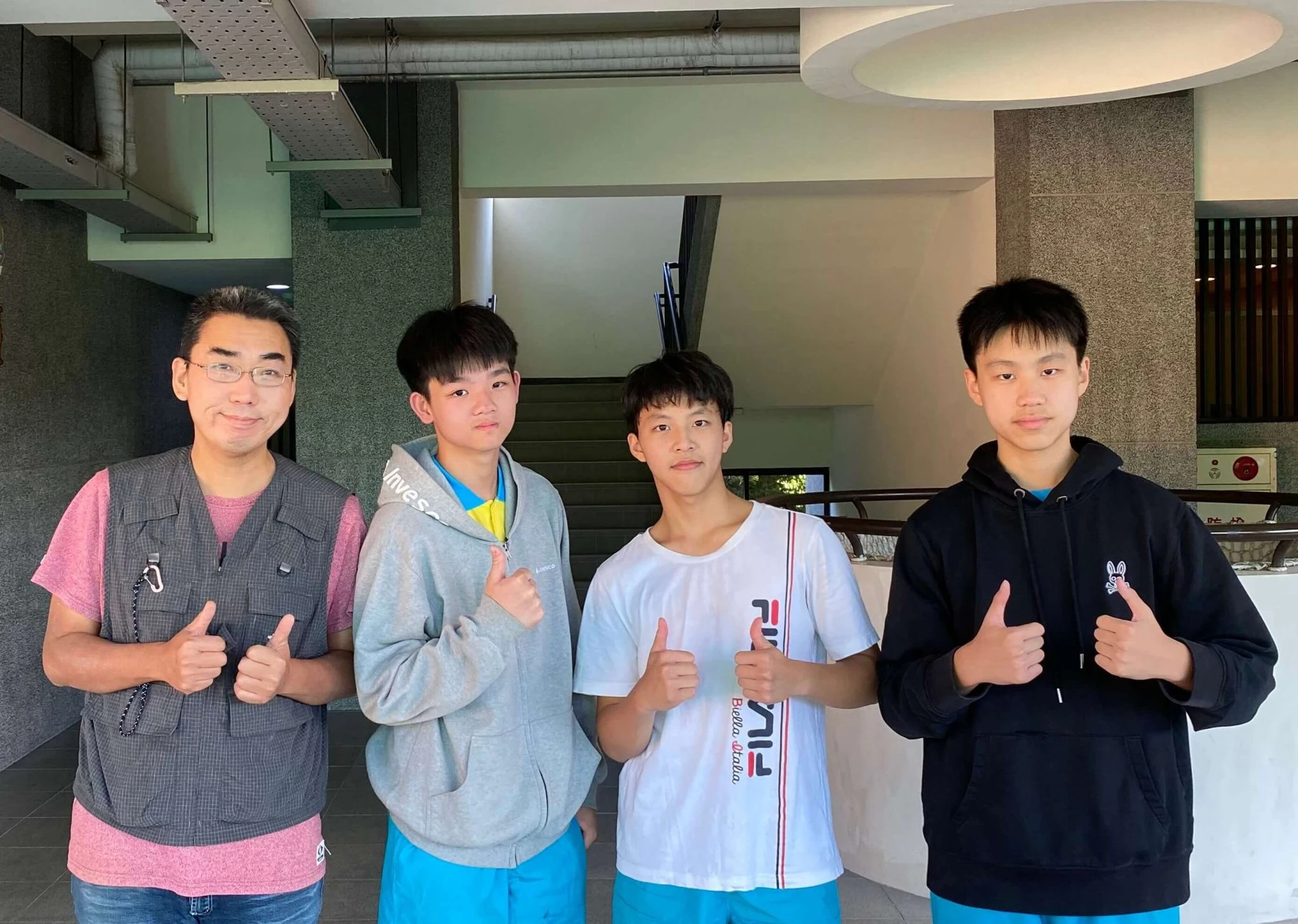Benjamin with his SDG teammates and teacher